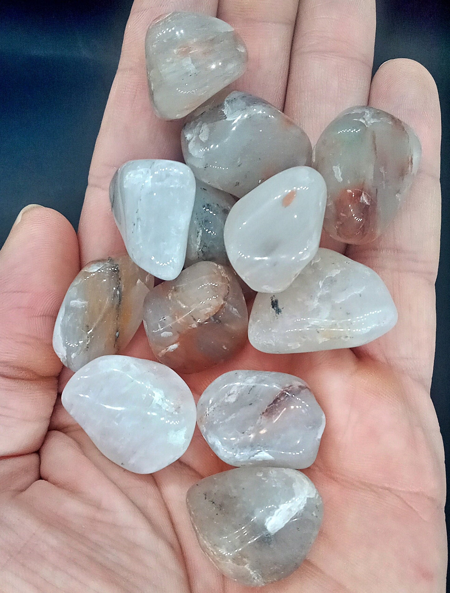 A-Grade Red and White Moonstone Crystals! Choose from six (6) sizes of tumbled Red and White Moonstone! Premium grade polished stones!