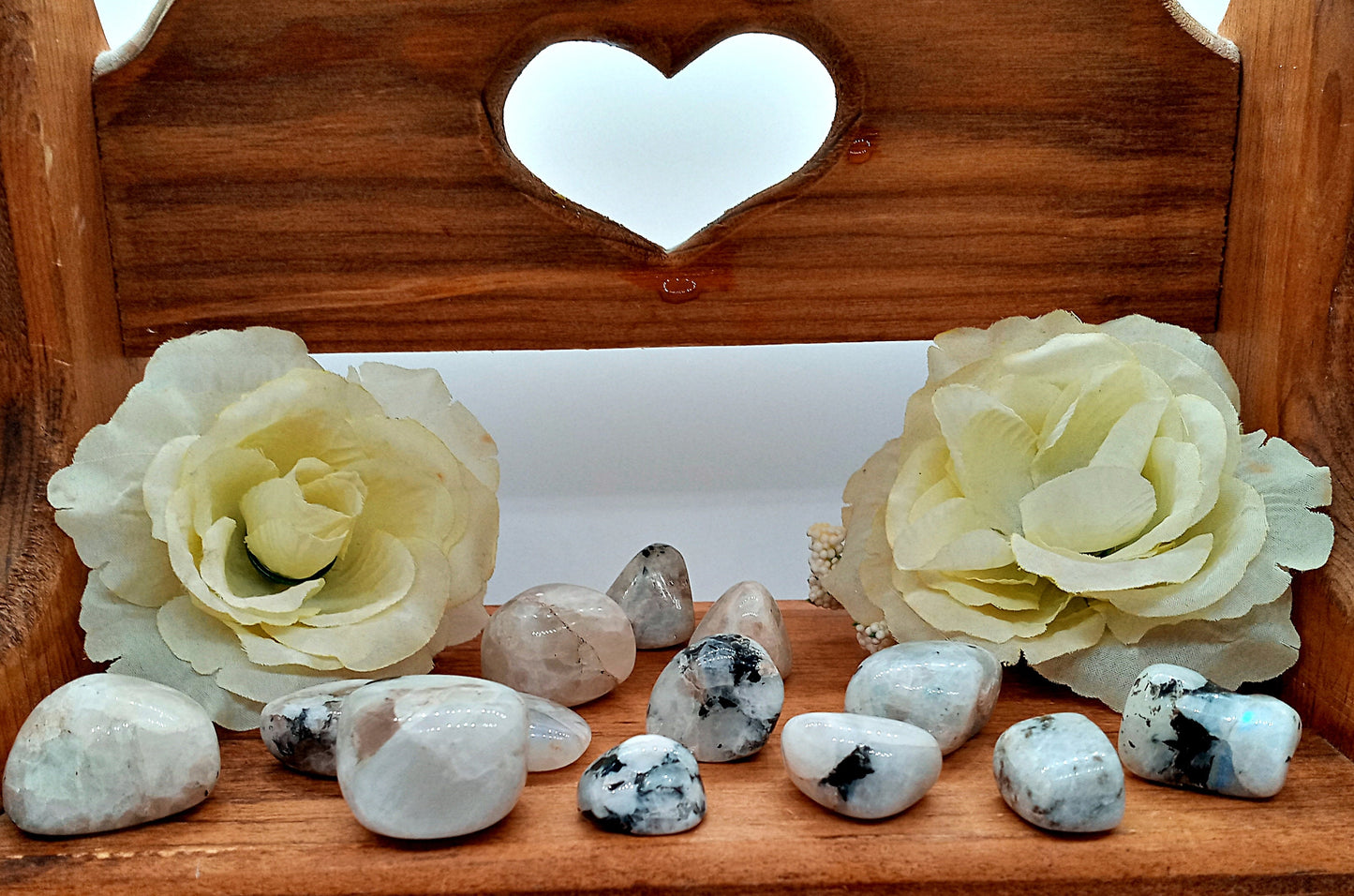 XQ Rainbow Moonstone Crystals! Choose from five (5) sizes of AAA-Grade, all natural, tumbled Extra High Quality Rainbow Moonstone stones.