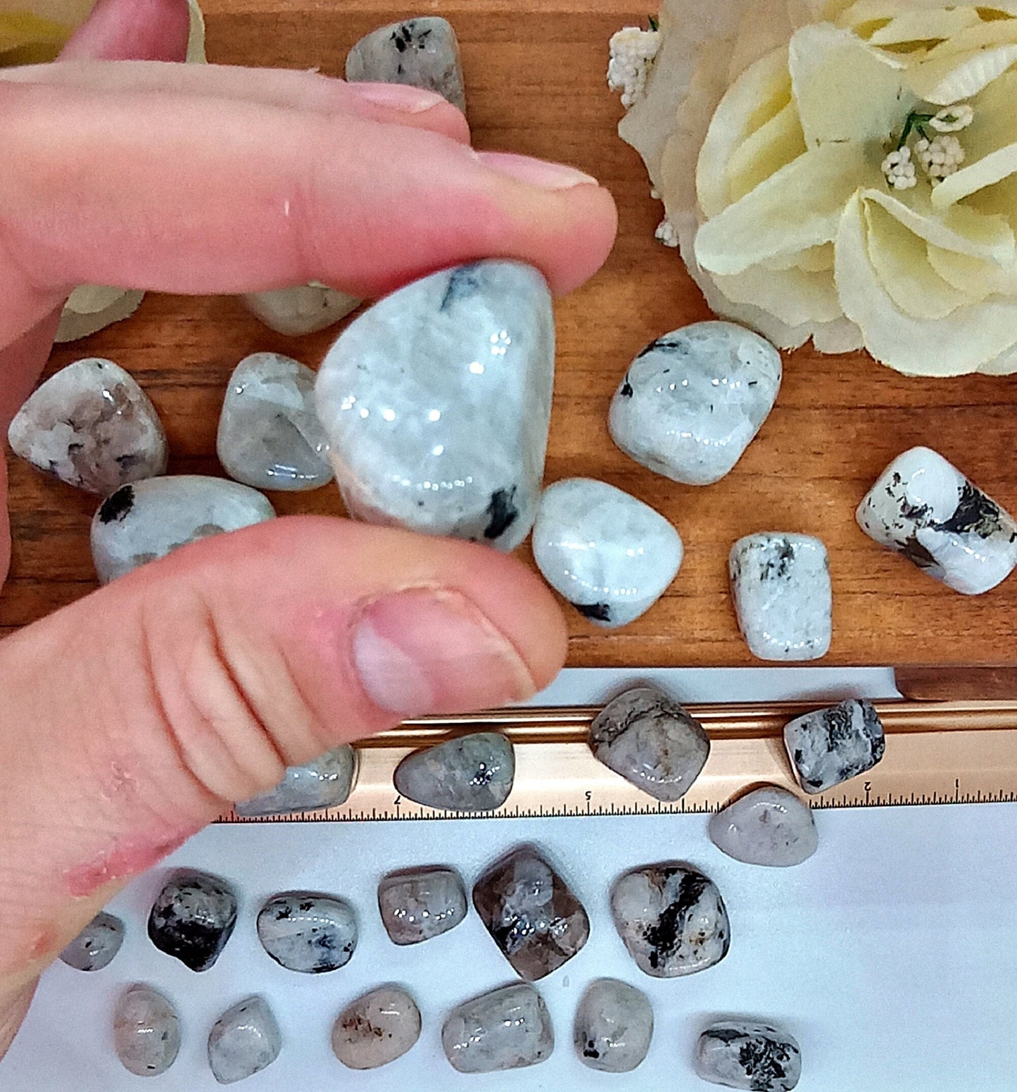 XQ Rainbow Moonstone Crystals! Choose from five (5) sizes of AAA-Grade, all natural, tumbled Extra High Quality Rainbow Moonstone stones.