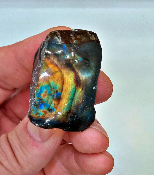 Labradorite with one beautifully polished face!  Labradorite stones and crystals.