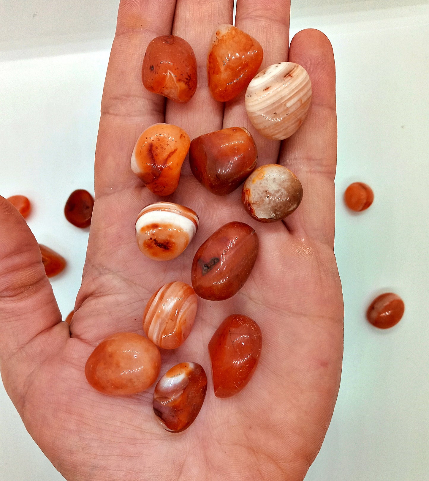 A-Grade Carnelian Crystals!  A-Grade, all natural, tumbled High Quality Carnelian crystals and stones.   Premium Polished Pocket crystals!