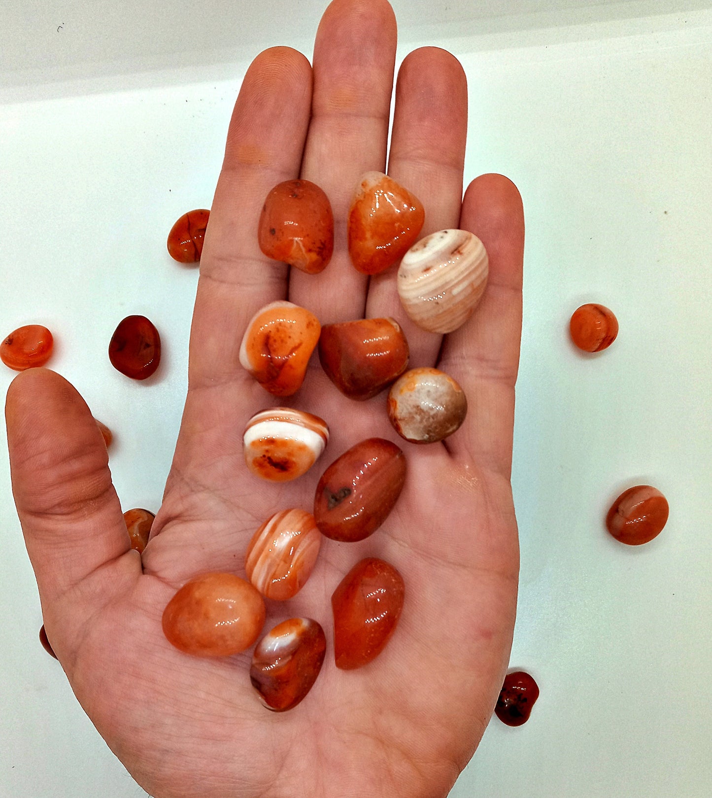 A-Grade Carnelian Crystals!  A-Grade, all natural, tumbled High Quality Carnelian crystals and stones.   Premium Polished Pocket crystals!