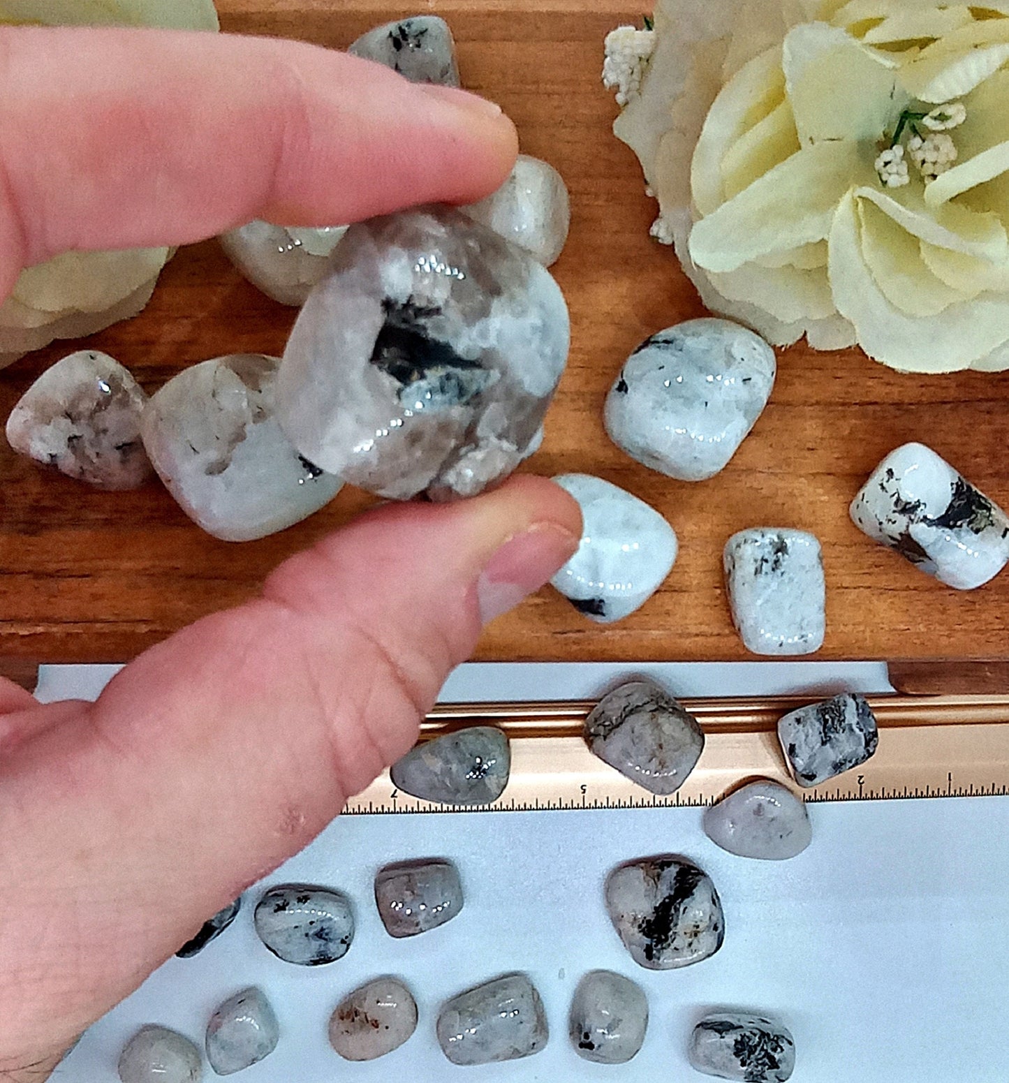 XQ Rainbow Moonstone Crystals! Choose from five (5) sizes of AAA-Grade, all natural, tumbled Extra High Quality Rainbow Moonstone stones.