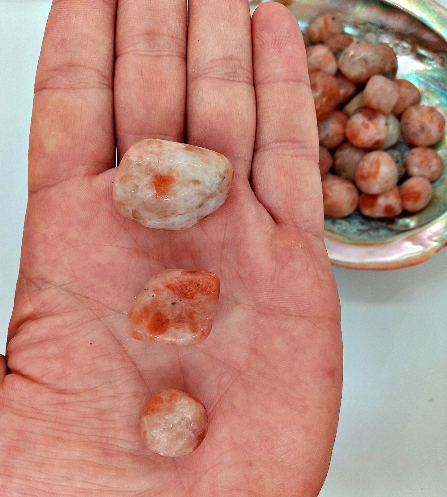 A-Grade Sunstone Crystals!  A-Grade, all natural, tumbled High Quality Sunstone crystals and stones!   Premium Grade polished Sunstone!